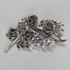 Elegant Silver Floral Brooch